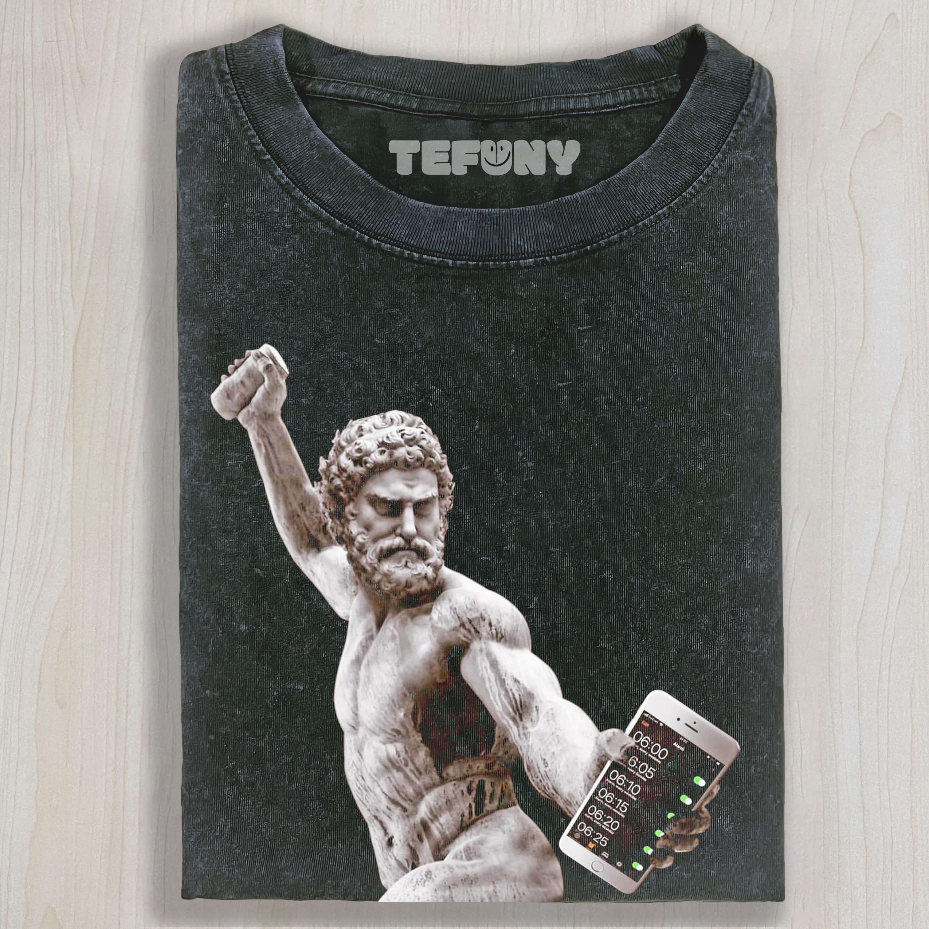 THE SCULPTURE IS HOLDING A CELL PHONE THAT'S A CLOCK T-SHIRT & LONG SLEEVES & HOODIES