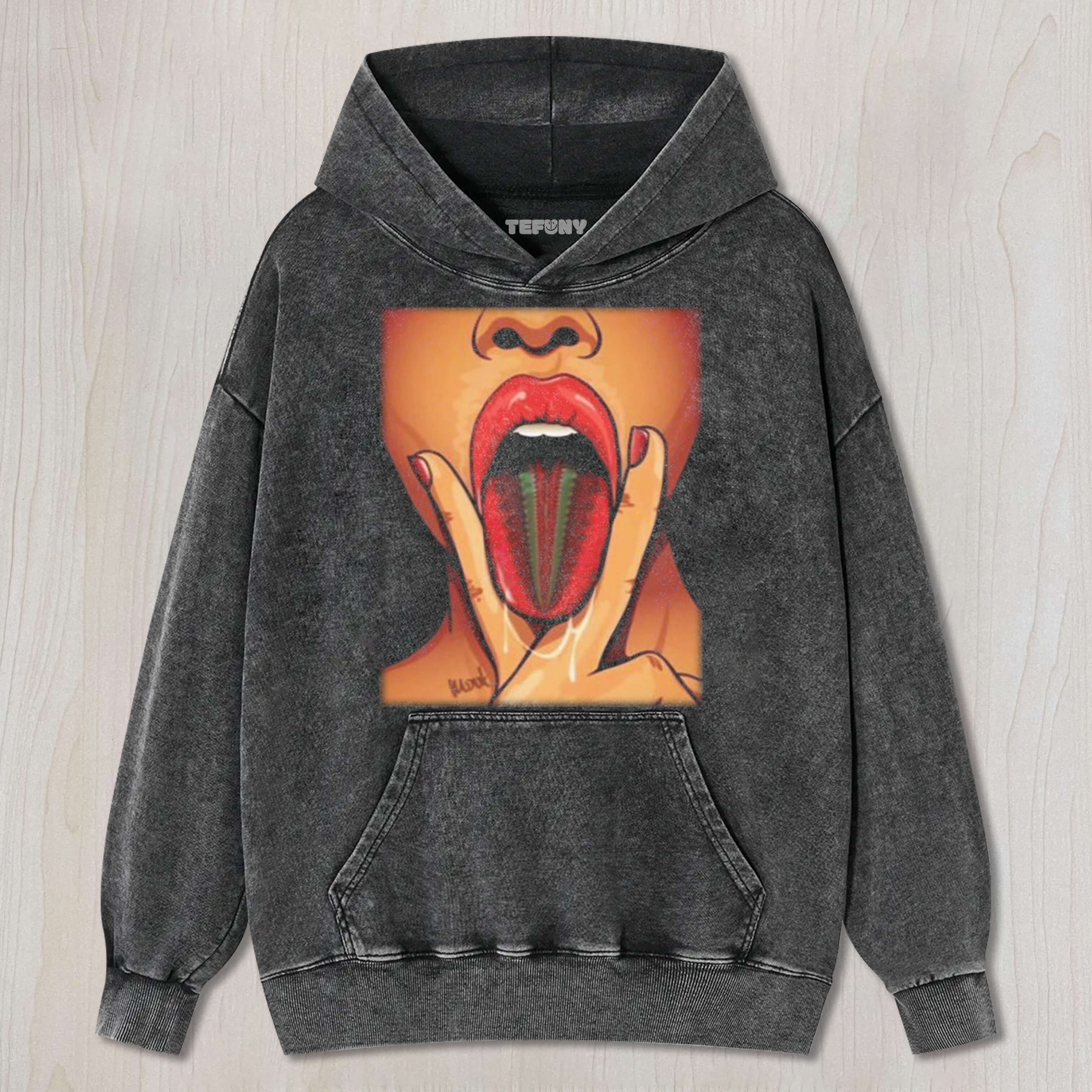 THE WOMAN PINCHED HER TONGUE WITH HER HAND TEE & SWEAT & HOOD