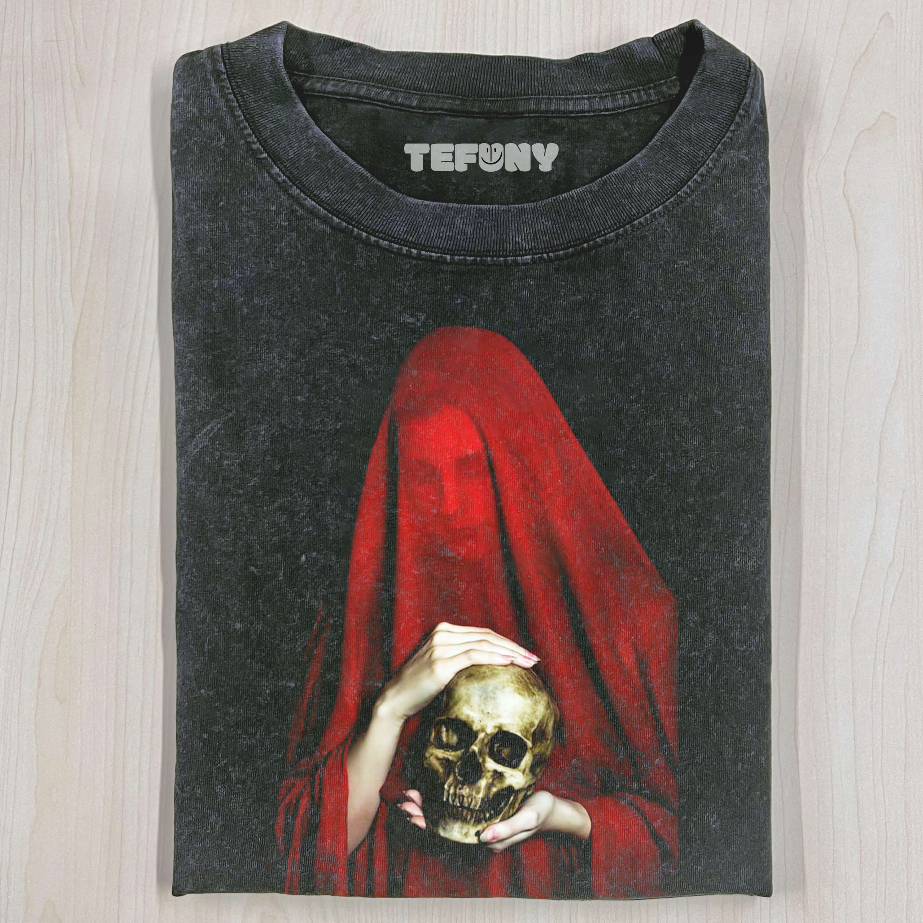 A FACE FROM A NEWSPAPER T-SHIRT
